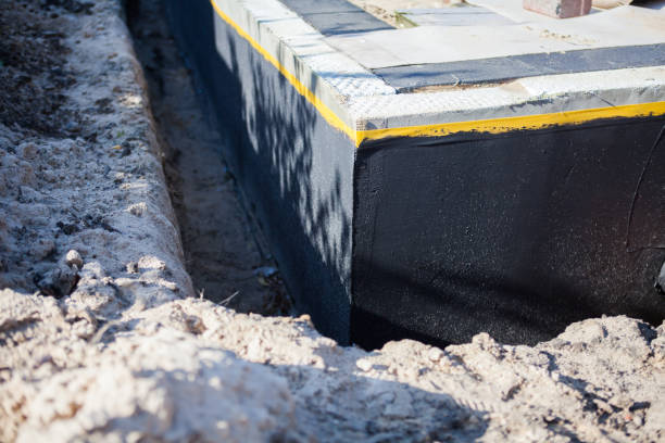 Professional Waterproofing technician working in Quinton, AL